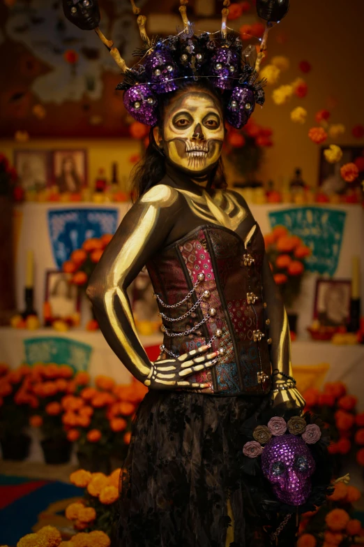 a person dressed as a skeleton is wearing a mask and dress