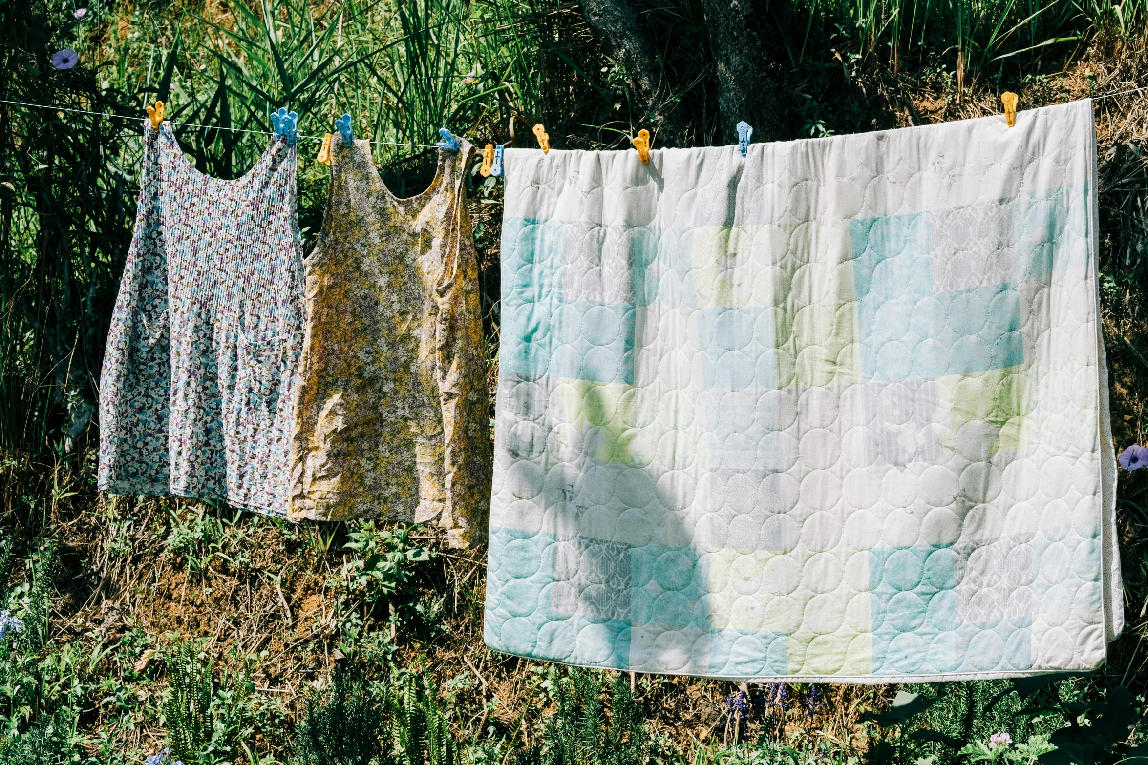 a row of clothes hung on clothes lines