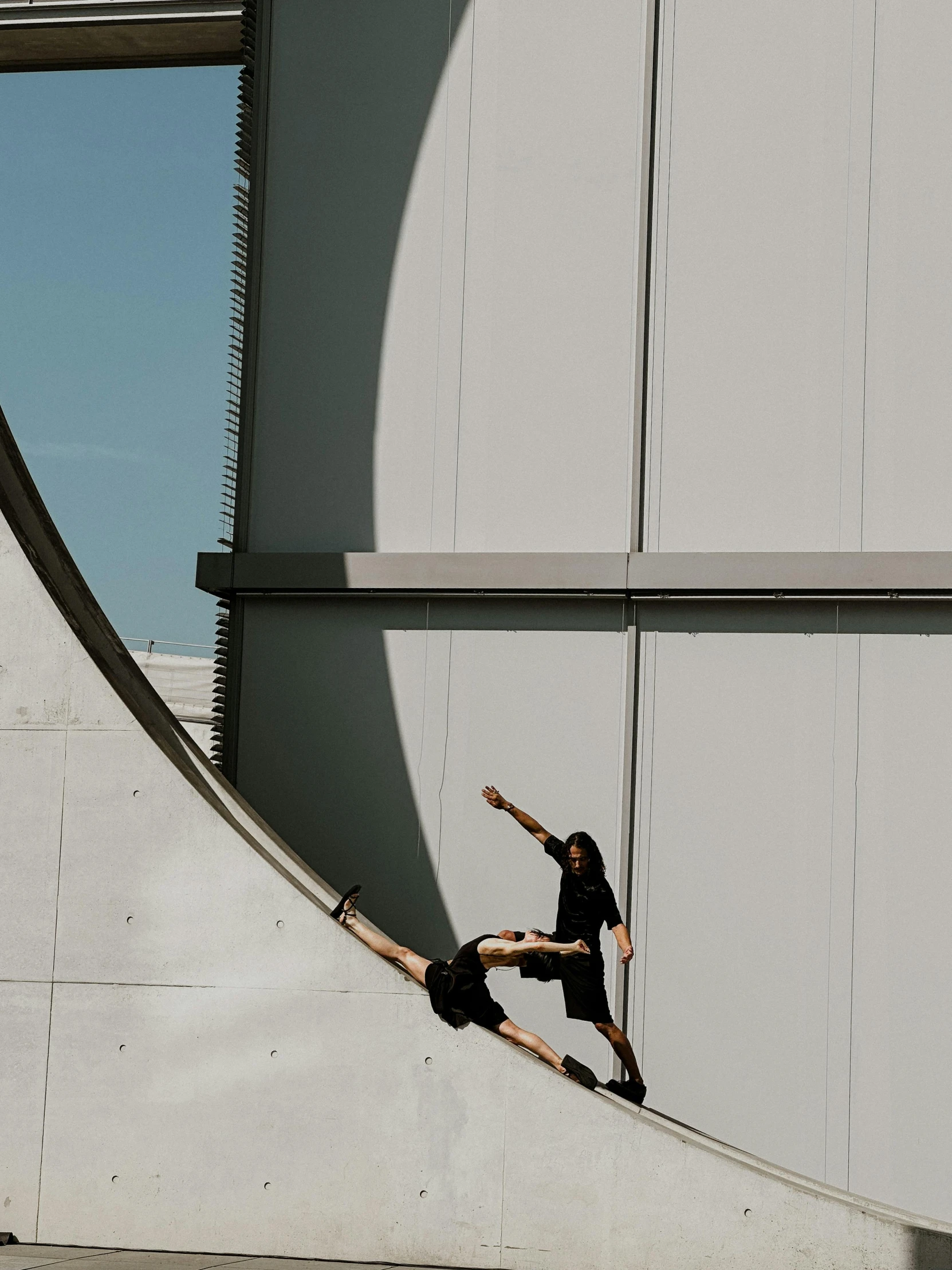 a person riding a skateboard on a ramp