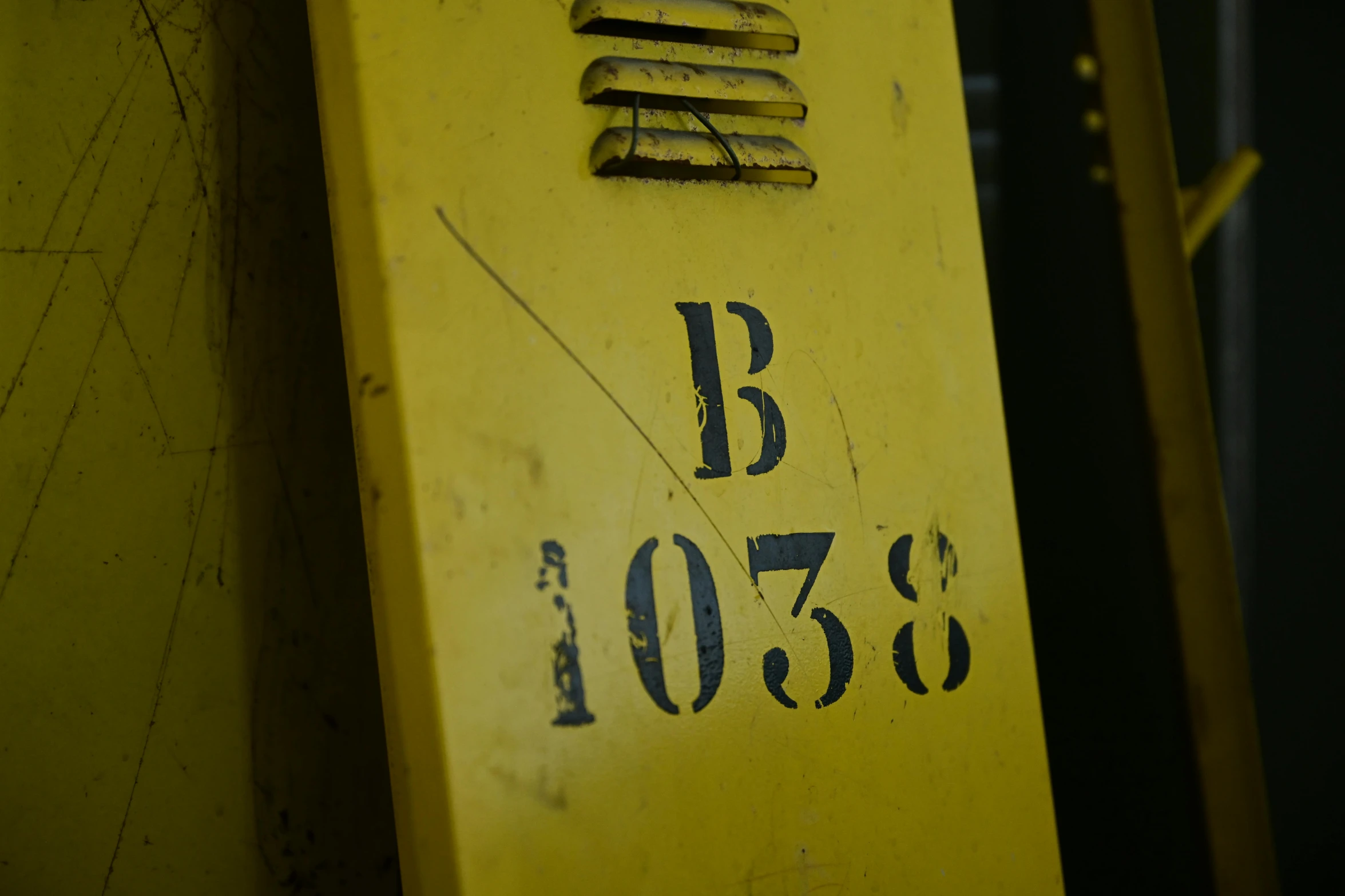 yellow piece of equipment with numbers on each of it