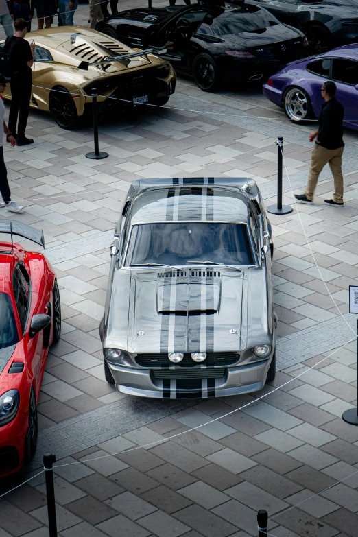 a car parked next to another car in a lot