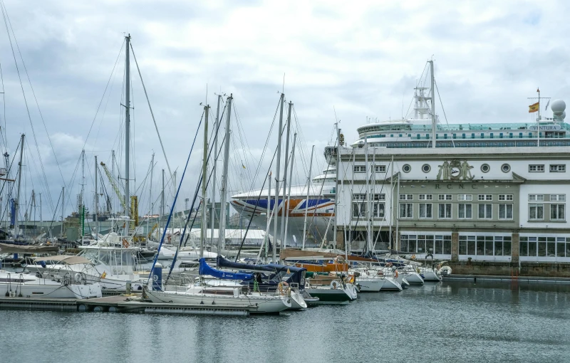 boats lined up in the water in front of buildings