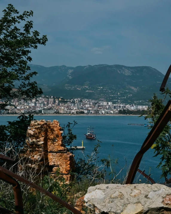 view from the top of a hill looking out at water