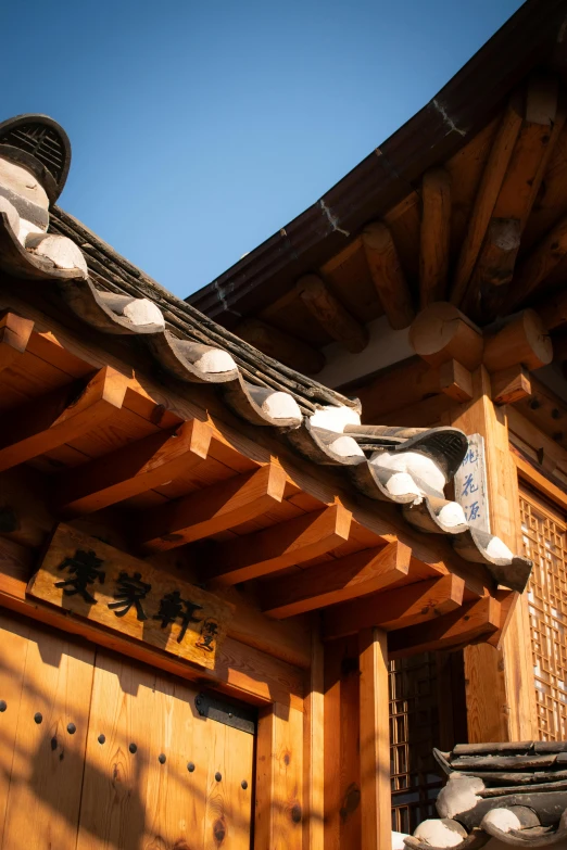 roof on a building with a sky background