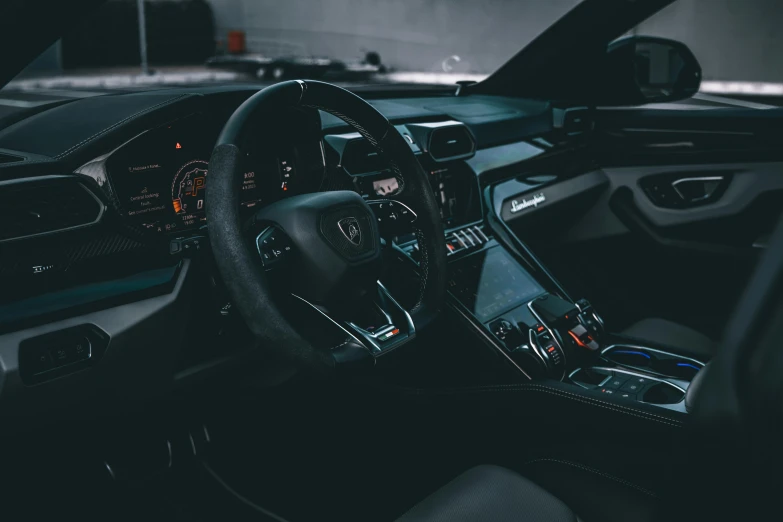 the interior of a car that has the dashboard and dash light up