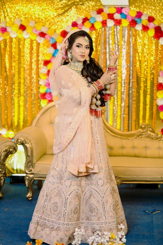 woman in wedding dress holding an item near flower and decor