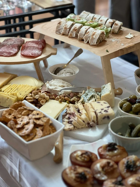 many dishes of food displayed on a table