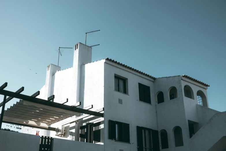 a house with a lot of windows on the roof