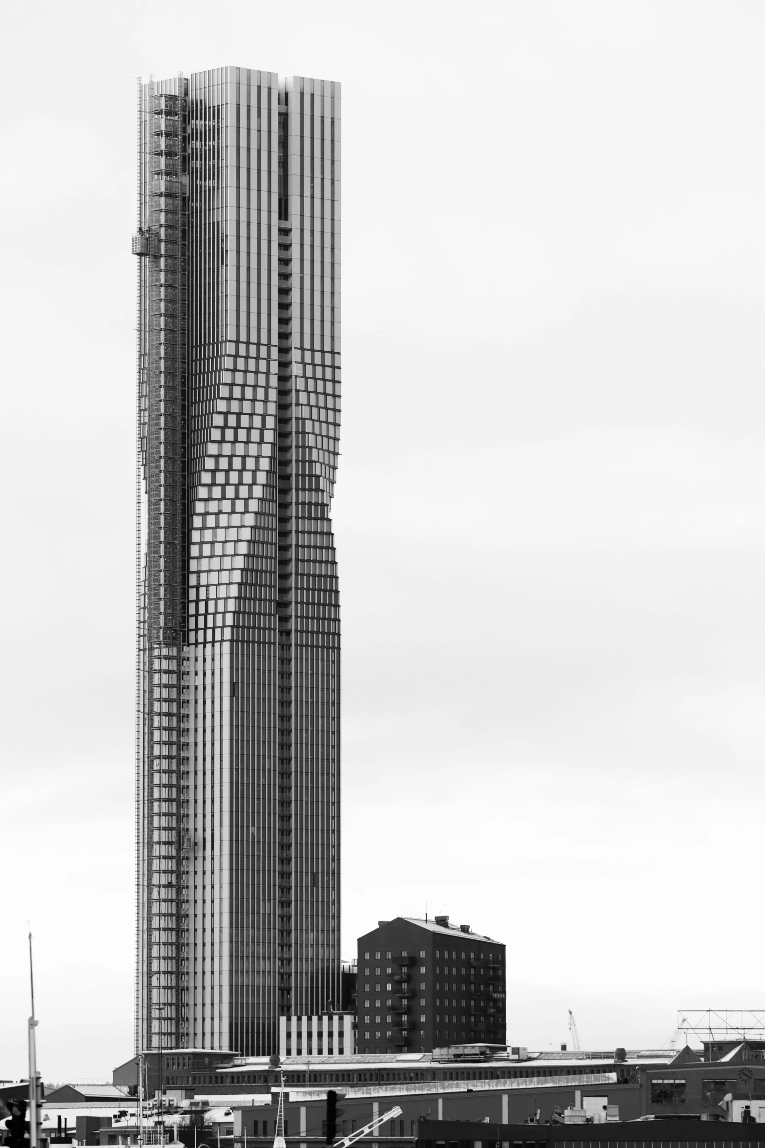 a tall skyscr with multiple stories and balconies