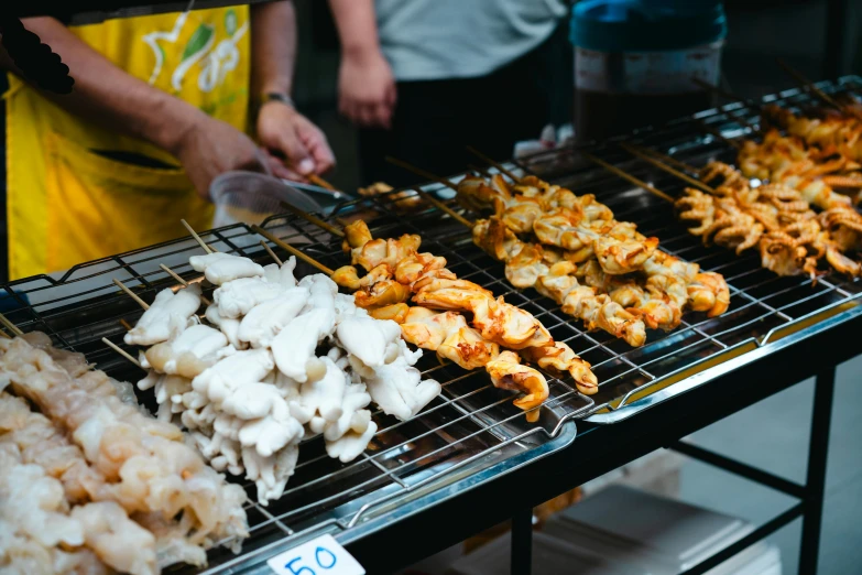 a group of people that are cooking food