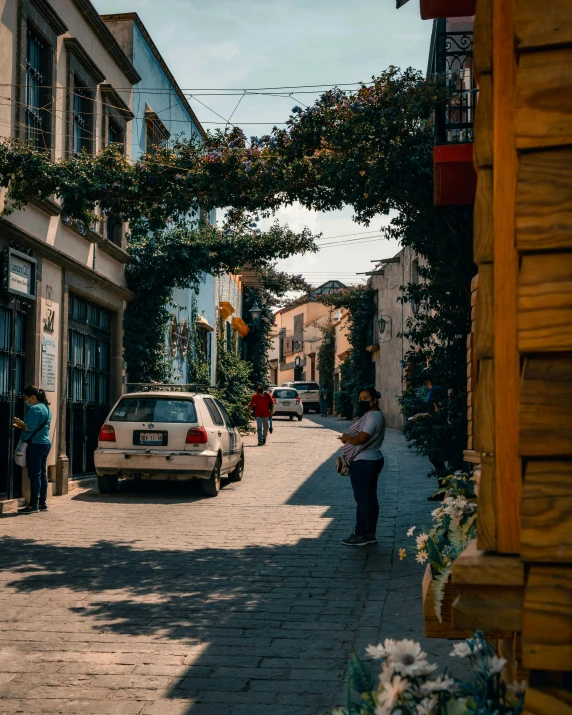 a car parked in front of a building on a street