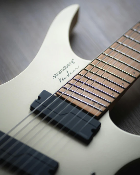 a close up of the strings on an electric guitar