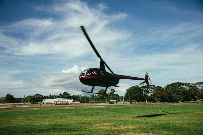 a helicopter with propellers is flying through the air