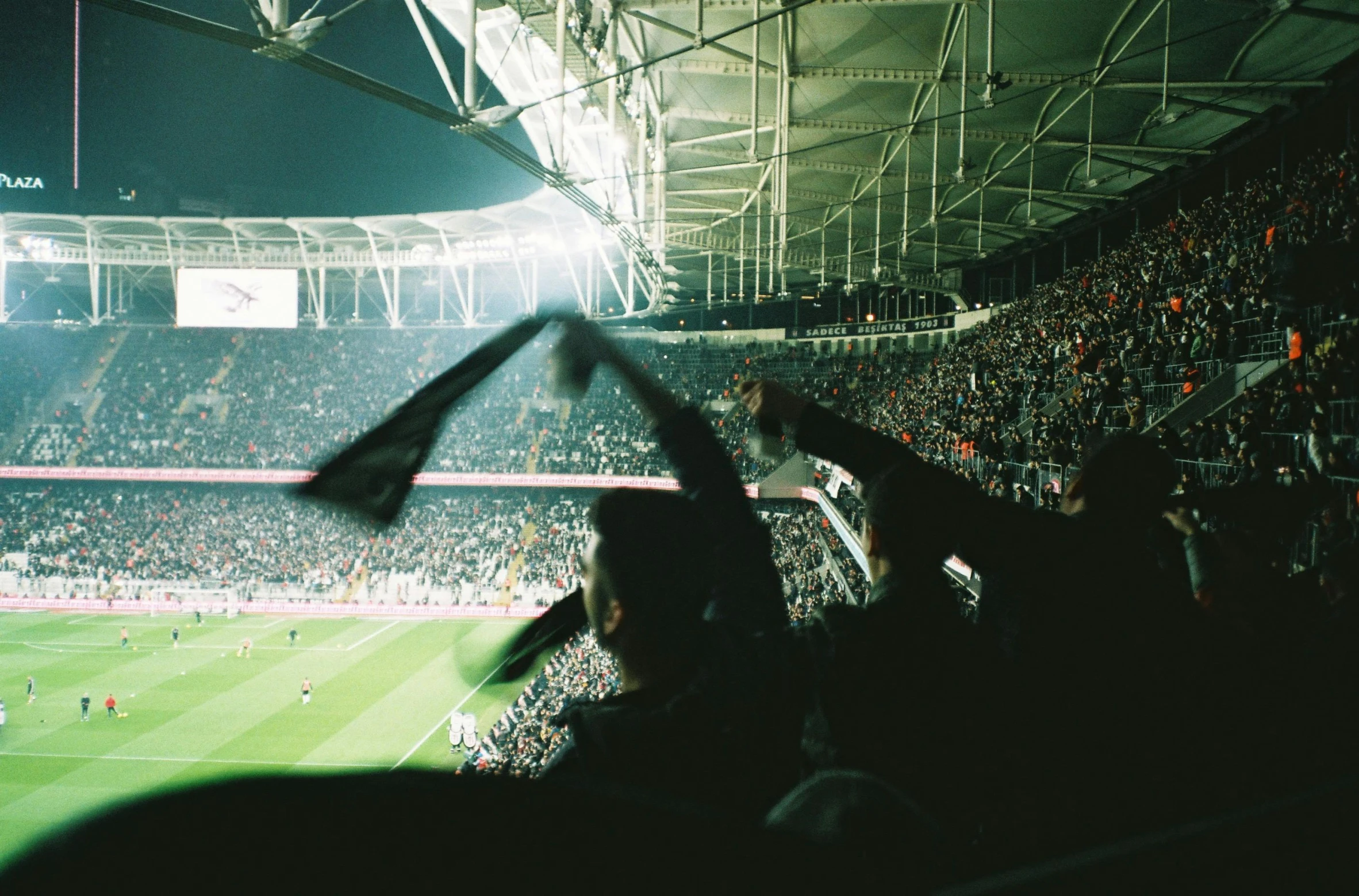 the crowd is in full view watching a professional soccer game