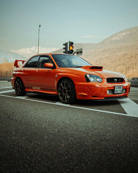 this car has two lights and is orange