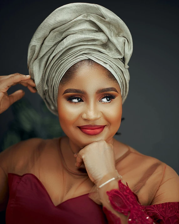 an african woman in a white head scarf