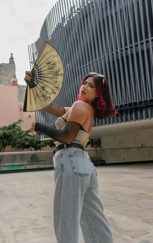 the girl is posing with her umbrella for a picture