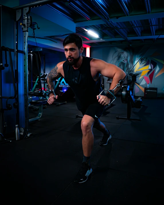 man on cross fit exercise in the gym