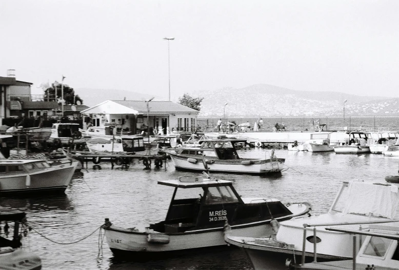 a group of boats parked on a body of water