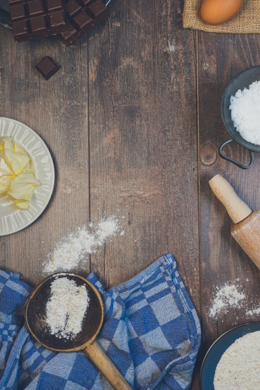 the ingredients to make an easy bread recipe on wooden table