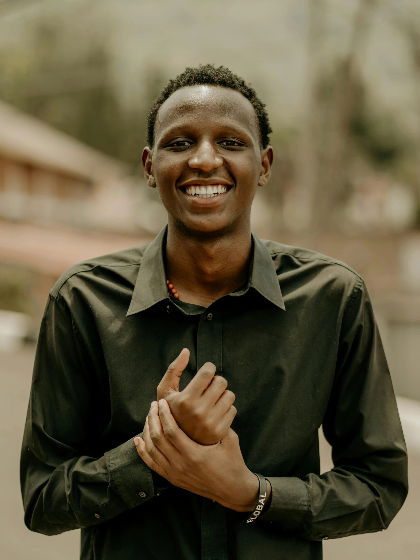 a young man who is standing in the street