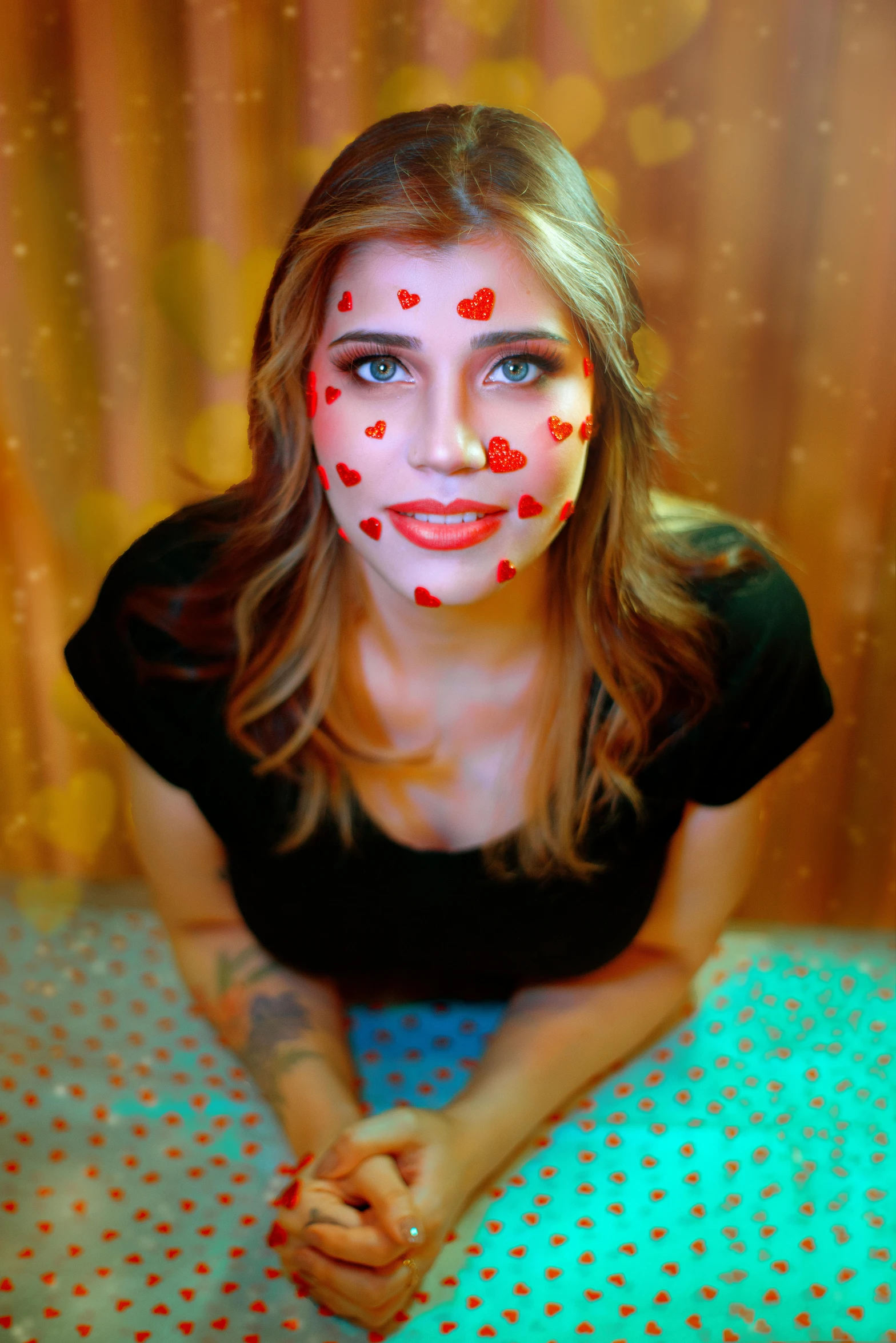 a girl with red and white face paint