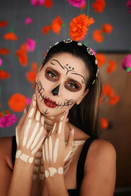 a girl with skeleton painted on her face