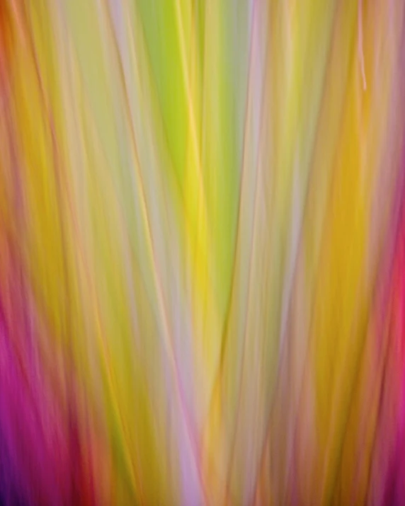 a colorful blurred background with only pink, yellow, and orange