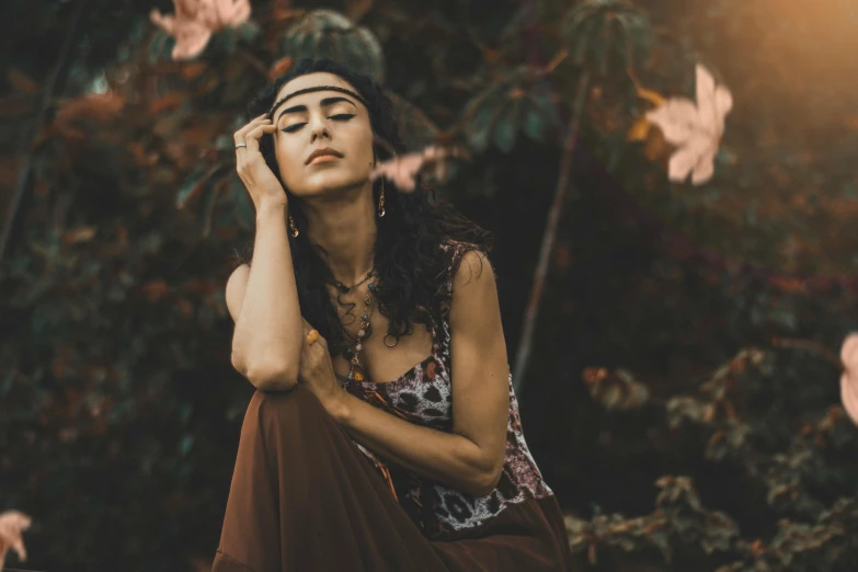 a woman who is holding a cell phone up to her face