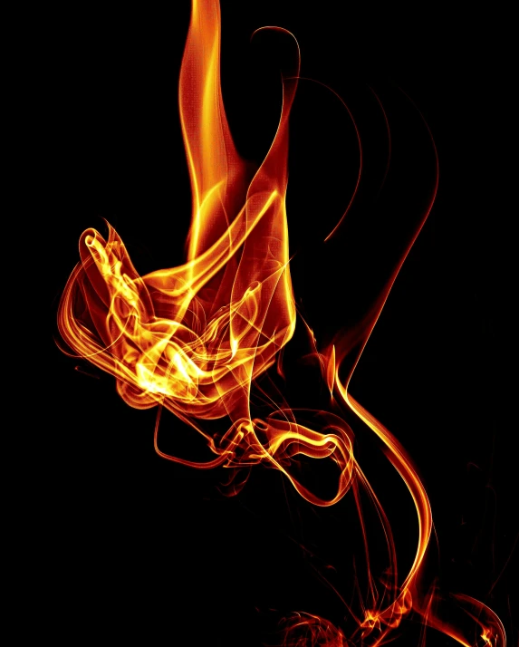 a red fire is shown in the dark