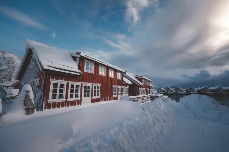 there is a house in the snow in winter