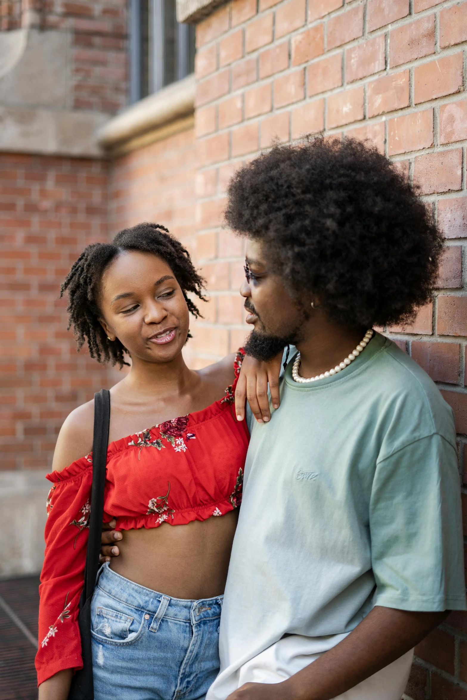 a couple of women standing next to each other