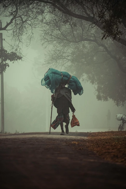 people with umbrellas walking in the rain on a rainy day