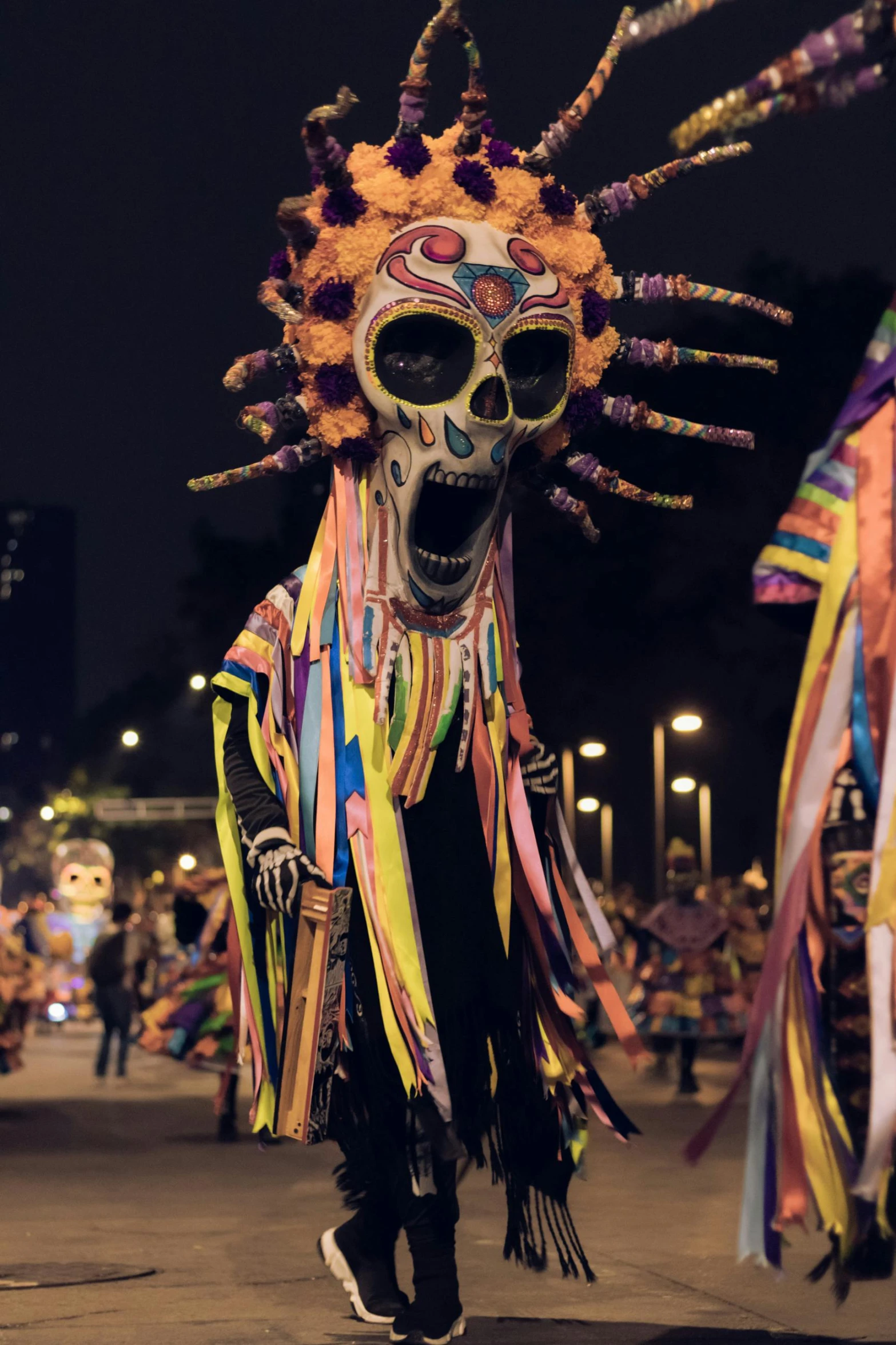 a person in a costume wearing a mask