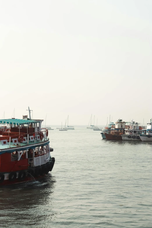 a large red boat in the water