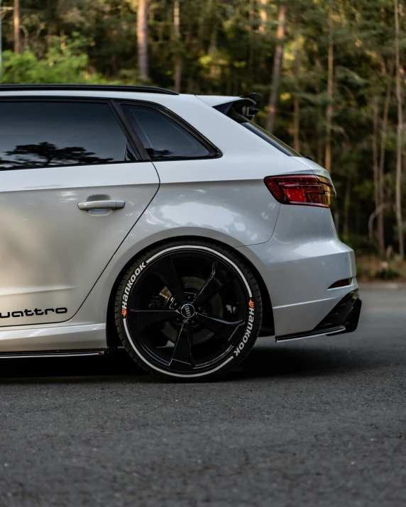 white car parked on the side of a road