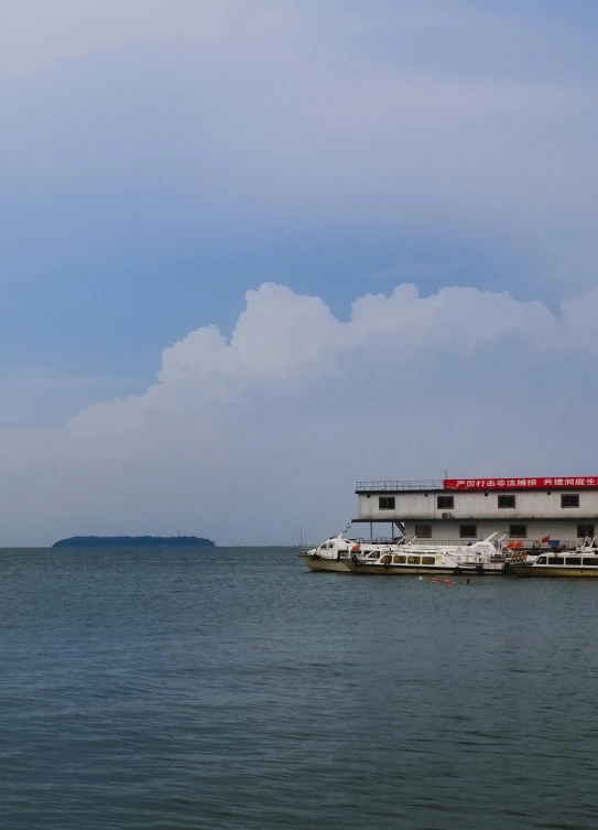 the big floating boat is out in the ocean