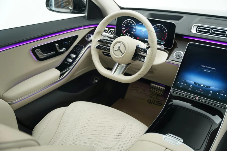 mercedes cls interior with steering wheel, display and phone