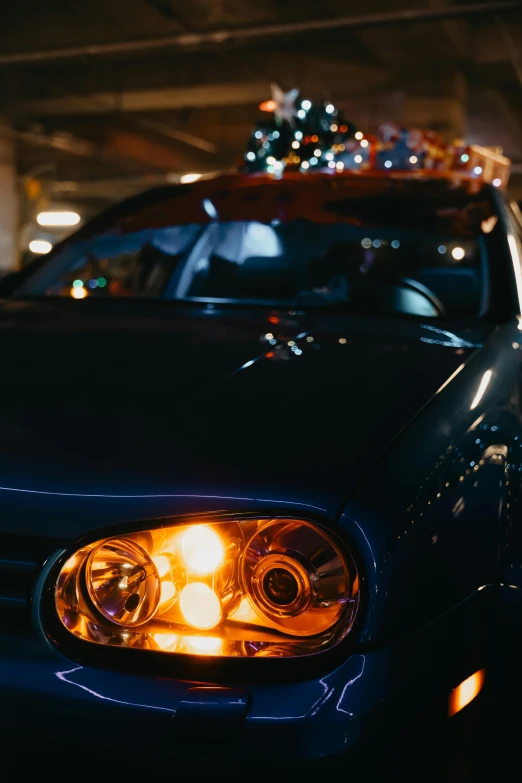 the tail lights of two parked cars