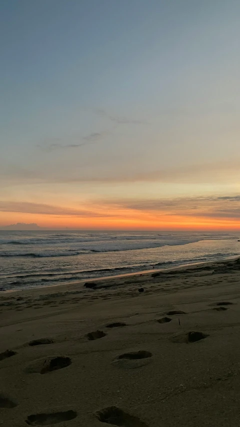 the man is surfing the waves at the beach