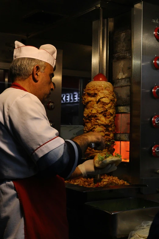 a man is cooking soing on the grill