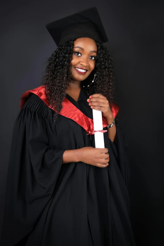 an image of a person holding up a diploma