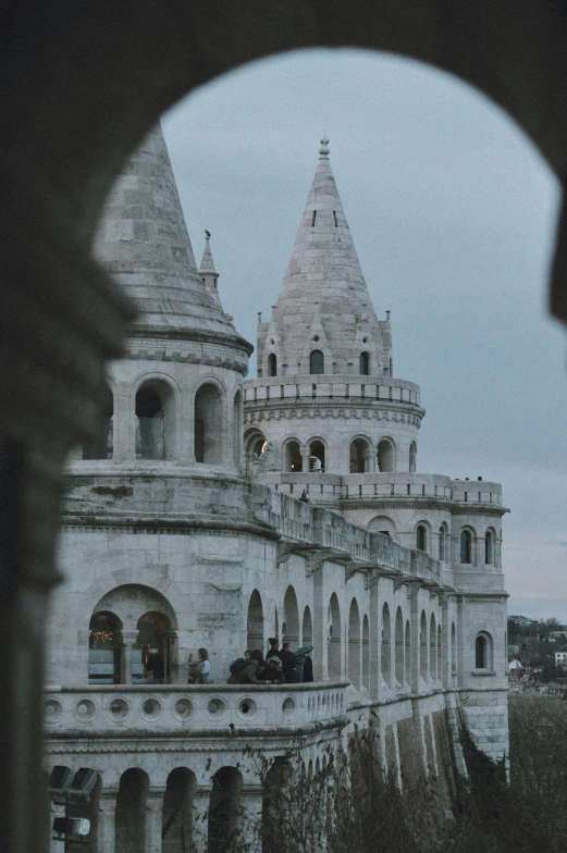 an old castle looks very majestic from across the street