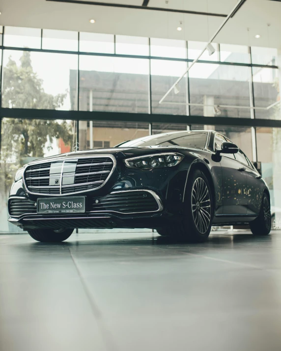 the front end of a modern car in an office building