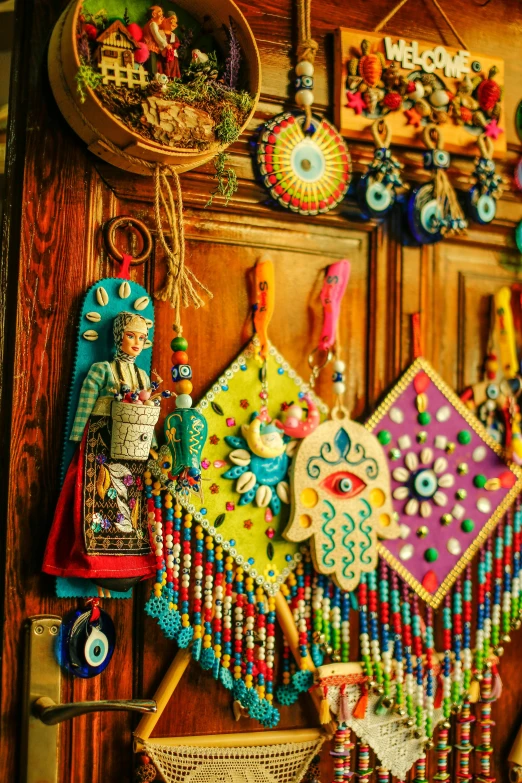 colorful items hang on a wooden wall and decor