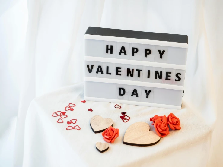 the valentine's day message is displayed on a table