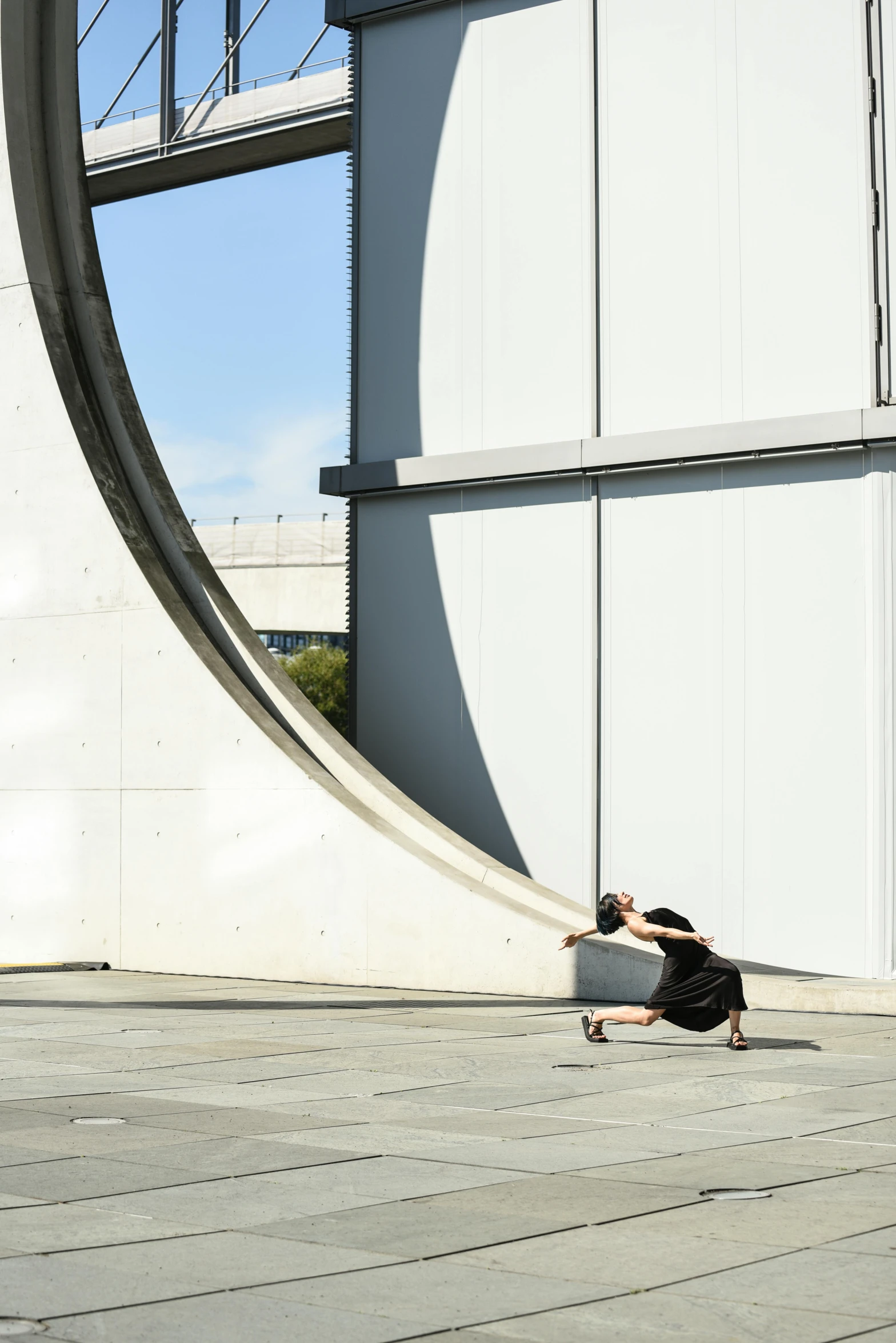 there is a woman that is sitting on the ground