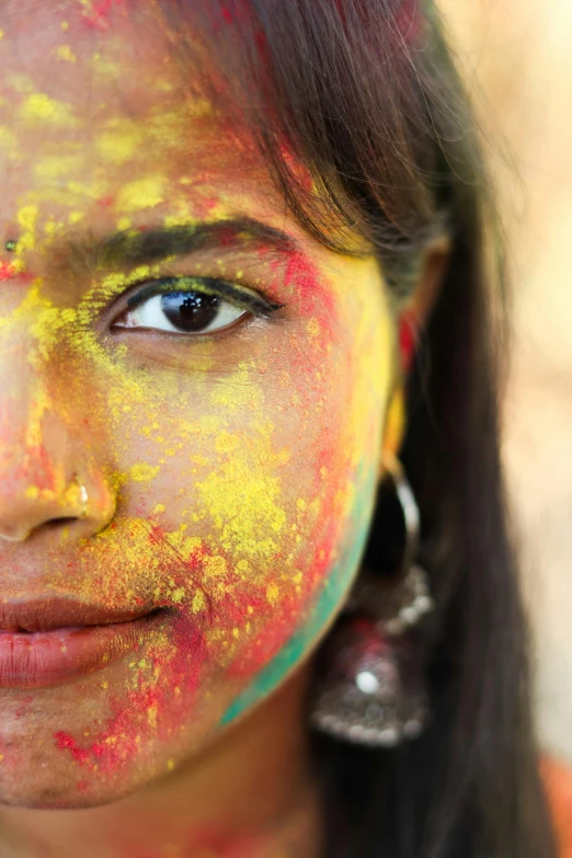 girl with colorful make up on her face