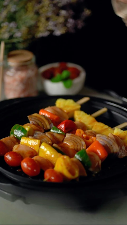 the platter has several different types of skewers of vegetables