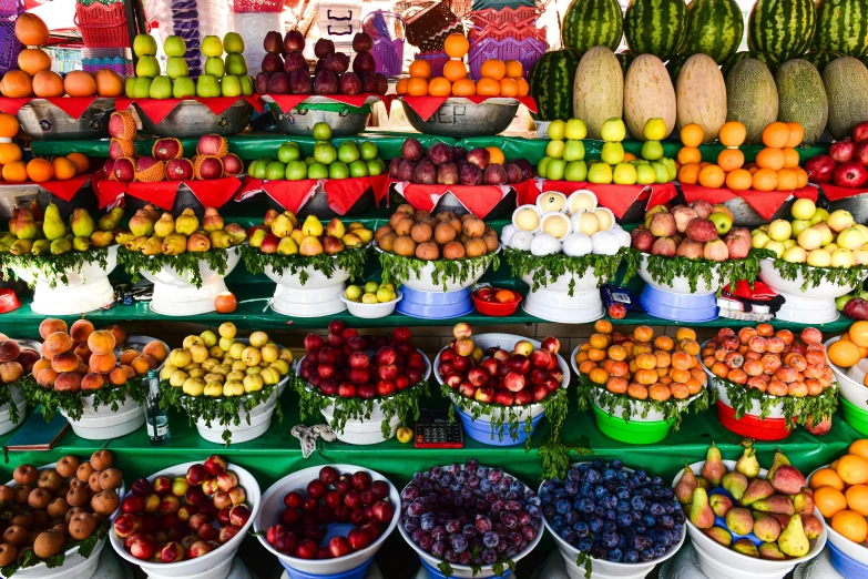 a display in a store filled with lots of fruit